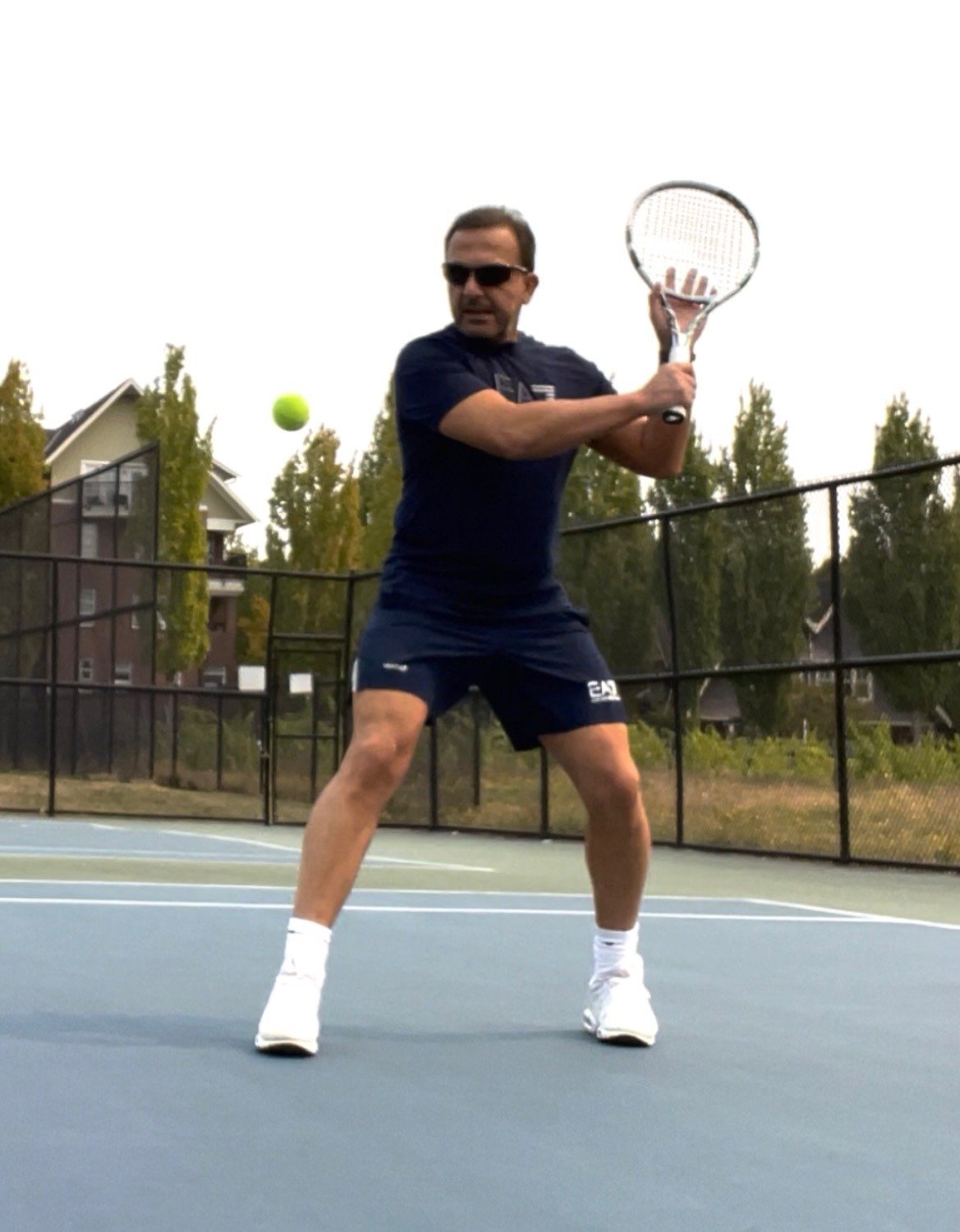 Dr. Fouad Alethawy playing tennis